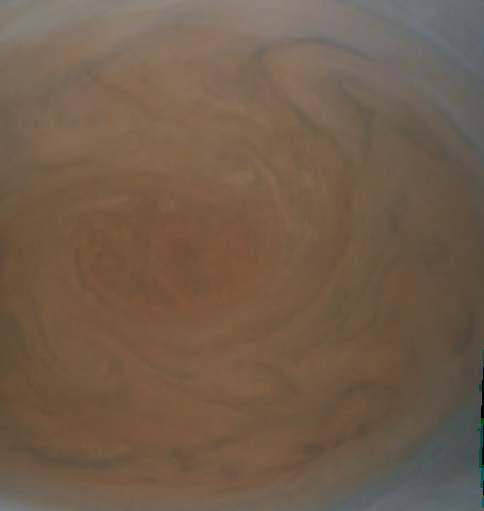 Close-up view of Jupiter's great red spot or storm that has been circling Jupiter's atmosphere for centuries